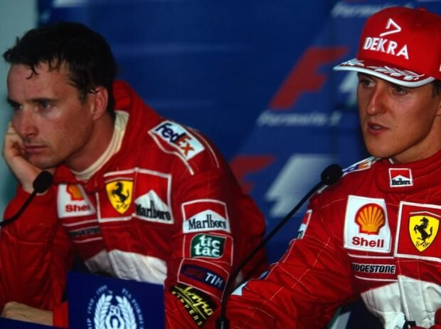 Titel-Bild zur News: Michael Schumacher und Eddie Irvine bei einer Pressekonferenz