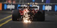 Ferrari-Fahrer Carlos Sainz im Formel-1-Auto mit Funkenflug