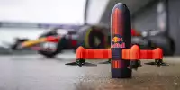 Die Red-Bull-Drohne RBD1 vor dem Formel-1-Auto