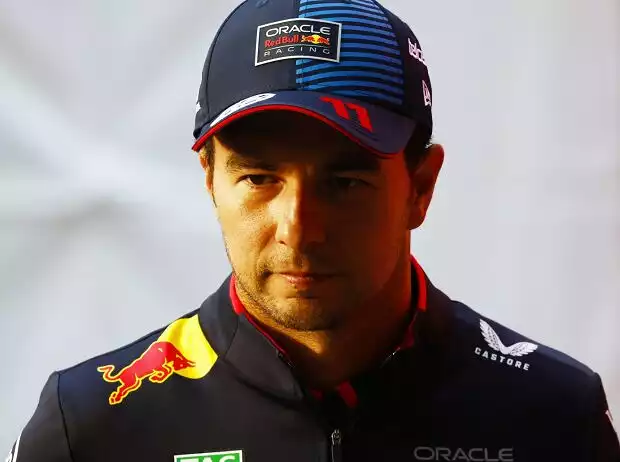 Titel-Bild zur News: Sergio Perez mit nachdenklicher Miene im Formel-1-Fahrerlager 2024
