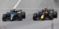 Max Verstappen (Red Bull RB20) und George Russell (Mercedes W15) beim Formel-1-Rennen in Spanien 2024