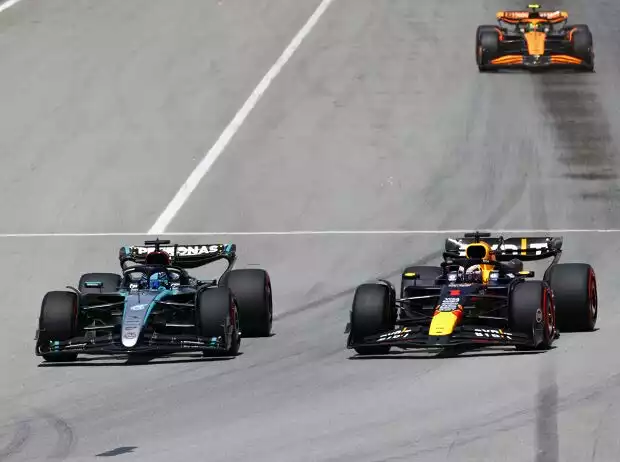 Max Verstappen (Red Bull RB20) und George Russell (Mercedes W15) beim Formel-1-Rennen in Spanien 2024 Titel-Bild zur News: Max Verstappen (Red Bull RB20) und George Russell (Mercedes W15) beim Formel-1-Rennen in Spanien 2024