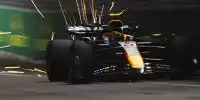 Sergio Perez im Red Bull RB20 mit Funkenflug am Heck