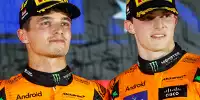Lando Norris und McLaren-Teamkollege Oscar Piastri auf dem Podium in Singapur 2024