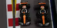 Lando Norris und Oscar Piastri (McLaren MCL38) beim Formel-1-Rennen in Singapur 2024