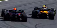 Max Verstappen im Red Bull RB20 neben Lando Norris im McLaren MCL38 in Zandvoort 2024
