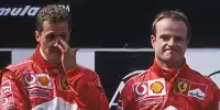Die beiden Ferrari-Fahrer Michael Schumacher und Rubens Barrichello auf dem Podium in Österreich 2002