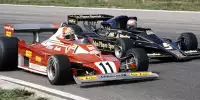 Niki Lauda im Ferrari vor Mario Andretti im Lotus
