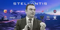 Carlos Ghosn vor den Logos der Stellantis-Marken