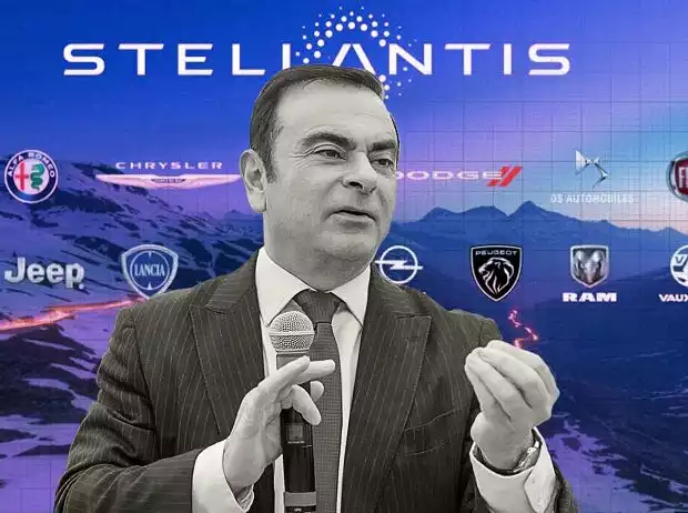 Carlos Ghosn vor den Logos der Stellantis-Marken Titel-Bild zur News: Carlos Ghosn vor den Logos der Stellantis-Marken