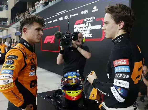 Lando Norris und Oscar Piastri im Parc ferme in Abu Dhabi Titel-Bild zur News: Lando Norris und Oscar Piastri im Parc ferme in Abu Dhabi