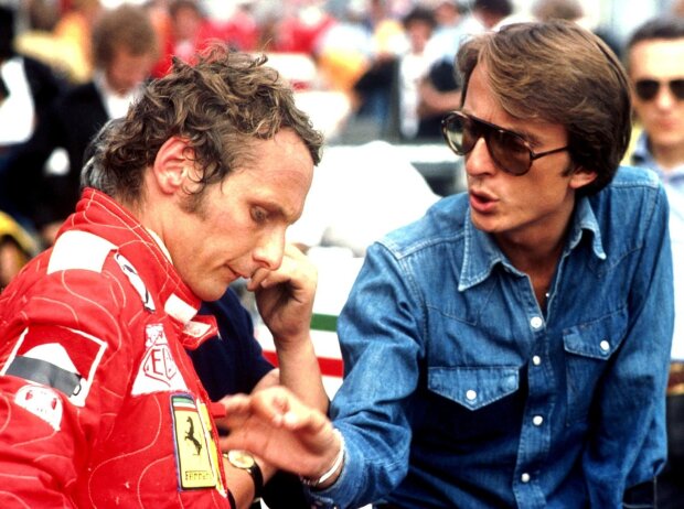 Ferrari-Fahrer Niki Lauda mit Teammanager Luca di Montezemolo Ferrari-Fahrer Niki Lauda mit Teammanager Luca di Montezemolo