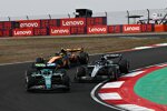 Lance Stroll (Aston Martin), George Russell (Mercedes) und Lando Norris (McLaren) 