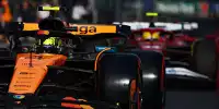 Lando Norris im McLaren vor Lewis Hamilton im Ferrari
