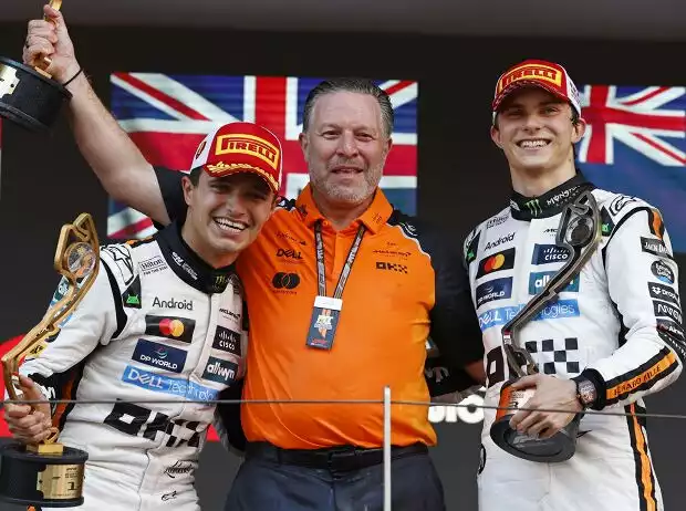 Titel-Bild zur News: Lando Norris, Zak Brown, Oscar Piastri