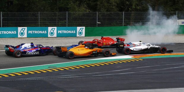 Für Sebastian Vettel begann der Italien-GP 2018 denkbar schlecht. Schon in der ersten Runde kollidierte der Ferrari-Pilot mit WM-Rivale Lewis Hamilton.
