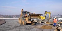 Bau der neuen Auslaufzone in den Porsche-Kurven