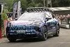 Bild zum Inhalt: Der neue Porsche Cayenne zeigt sich bei einem Rennen